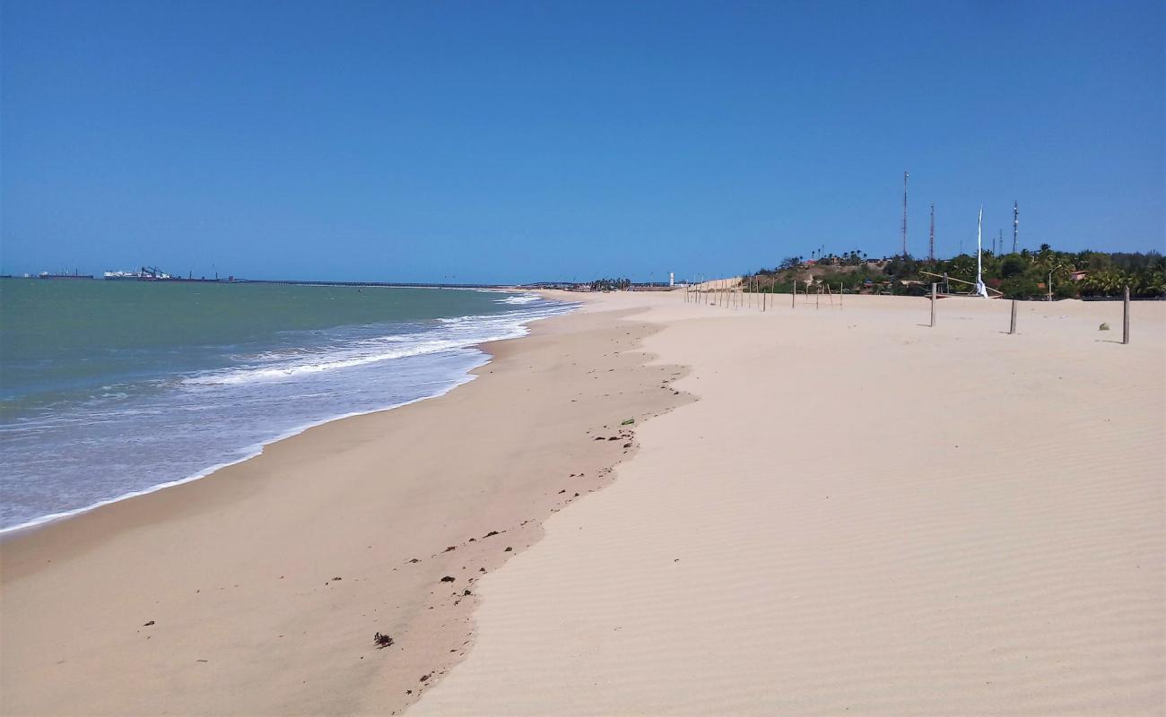 Фото Praia do Pecem с золотистый песок поверхностью