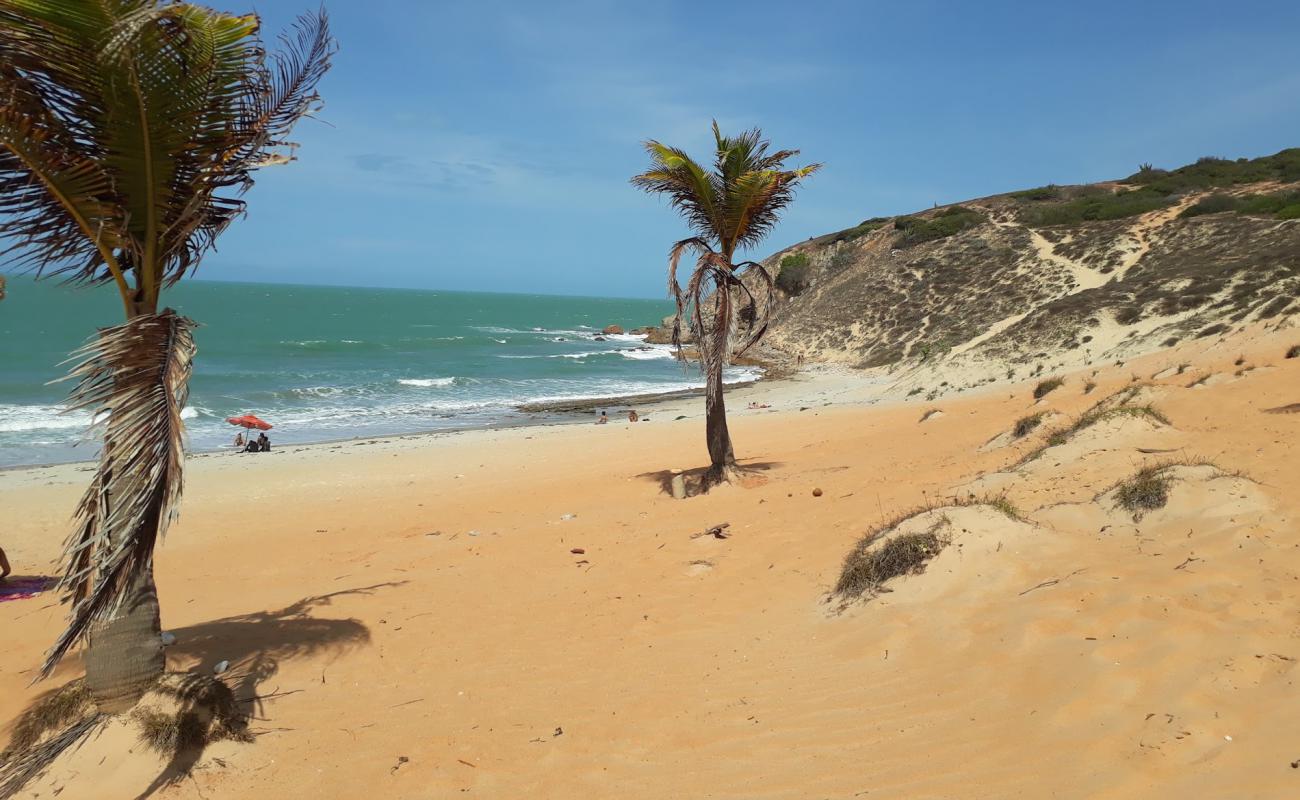 Фото Praia da Malhada с светлый песок поверхностью