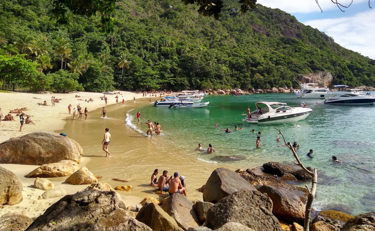 Фото Praia dos Meros с светлый песок поверхностью