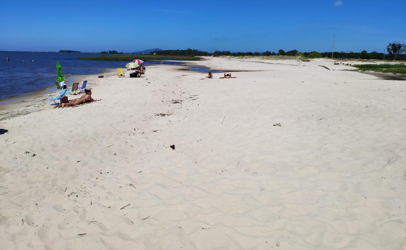 Фото Varzinha Beach с светлый песок поверхностью