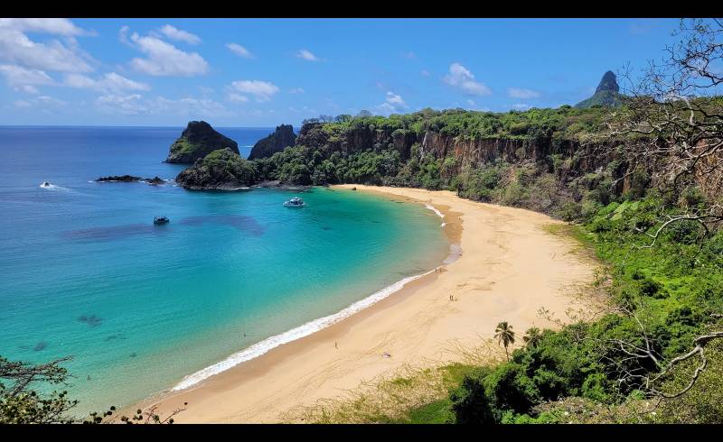 Фото Praia do Sancho с золотистый песок поверхностью