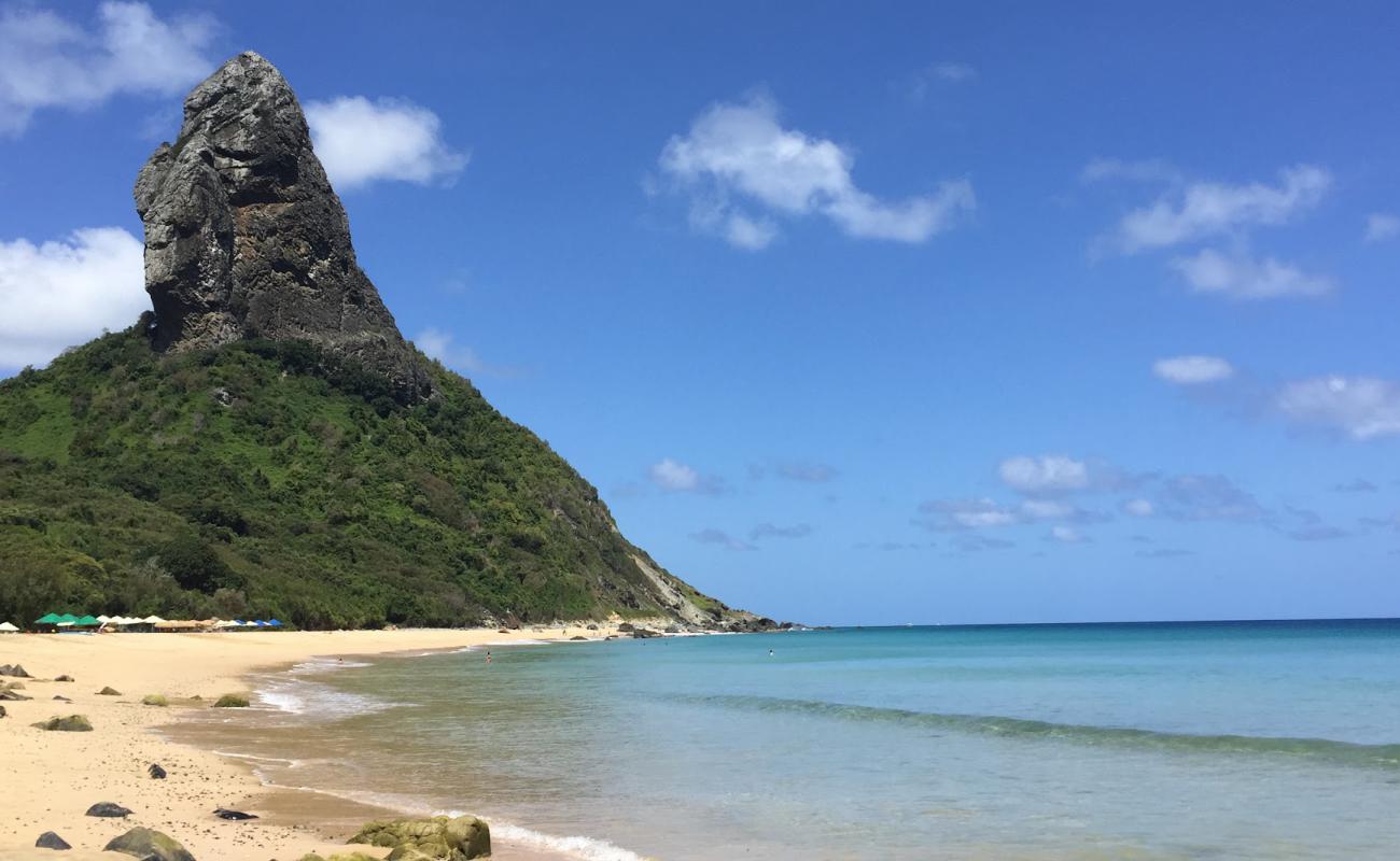 Фото Praia da Conceicao с светлый песок поверхностью