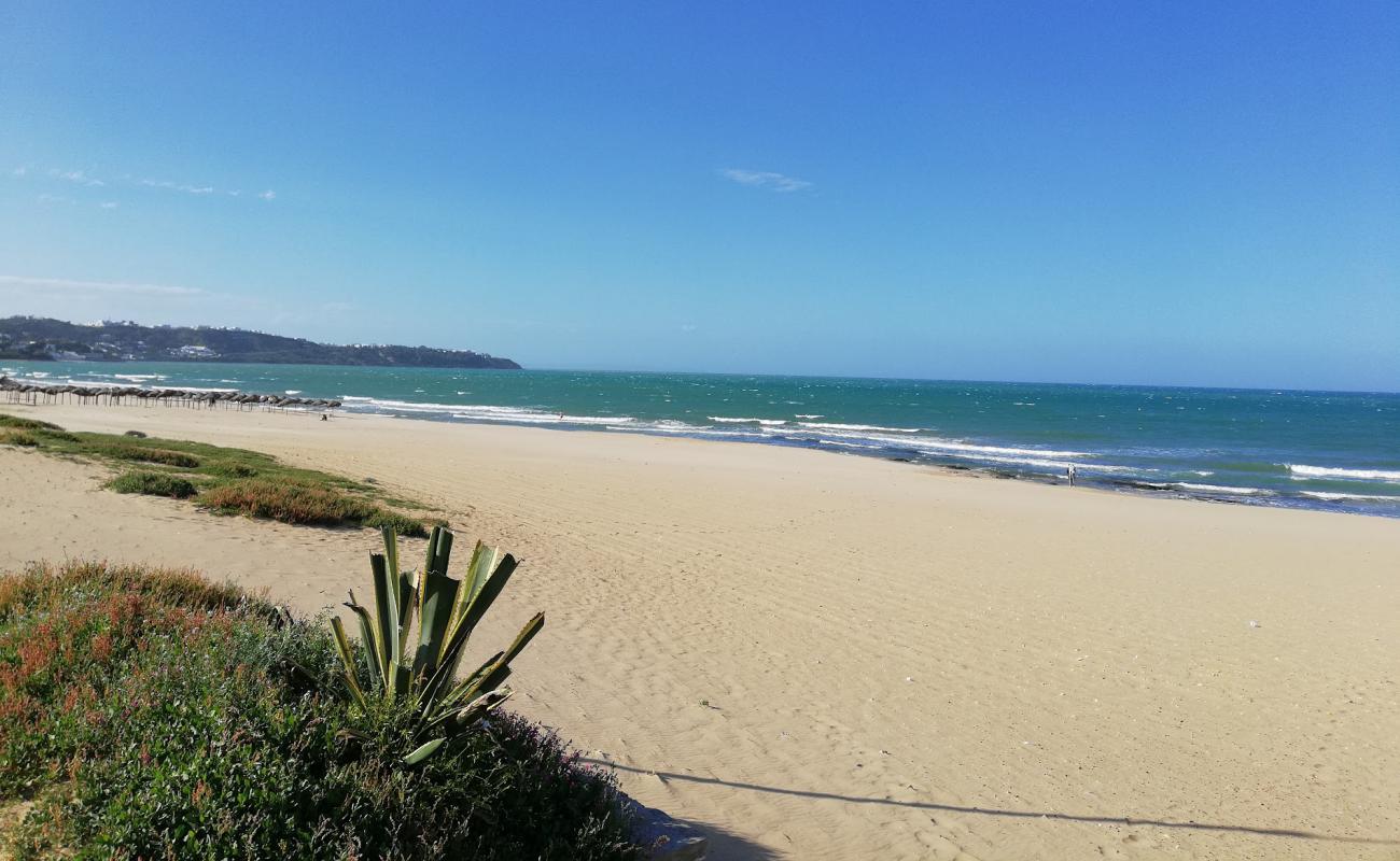 Фото Plage de La Marsa с золотистый песок поверхностью