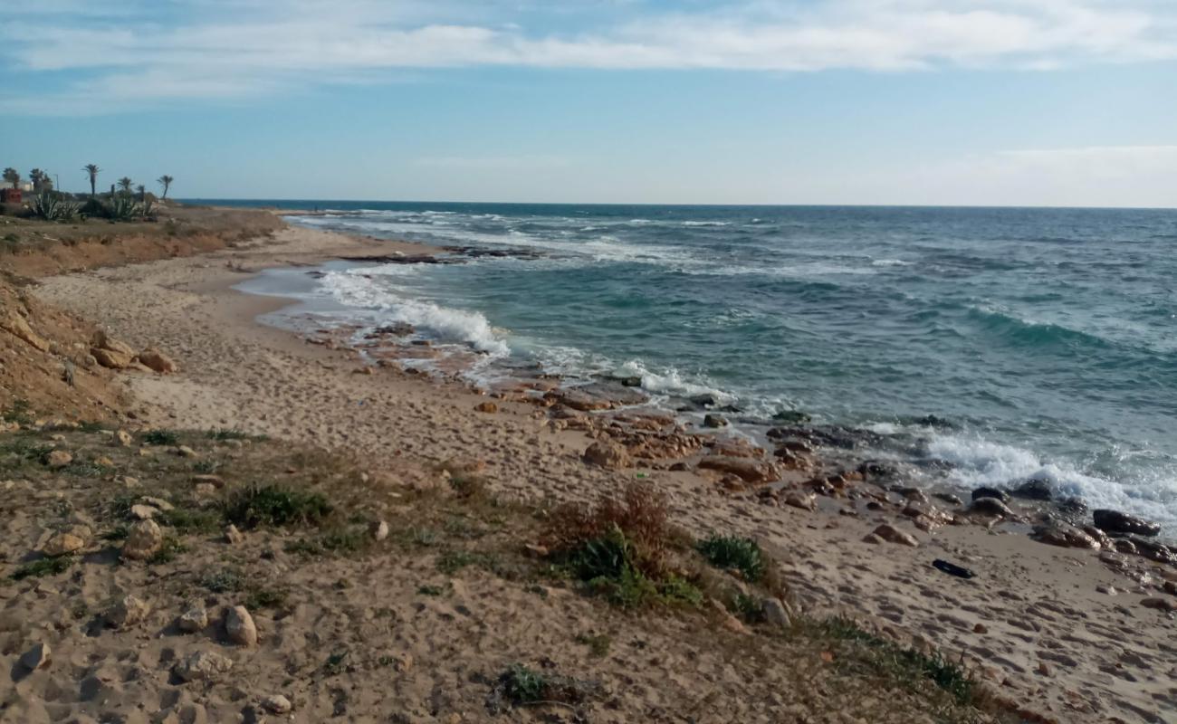 Фото Maamoura Plage II с светлый песок поверхностью