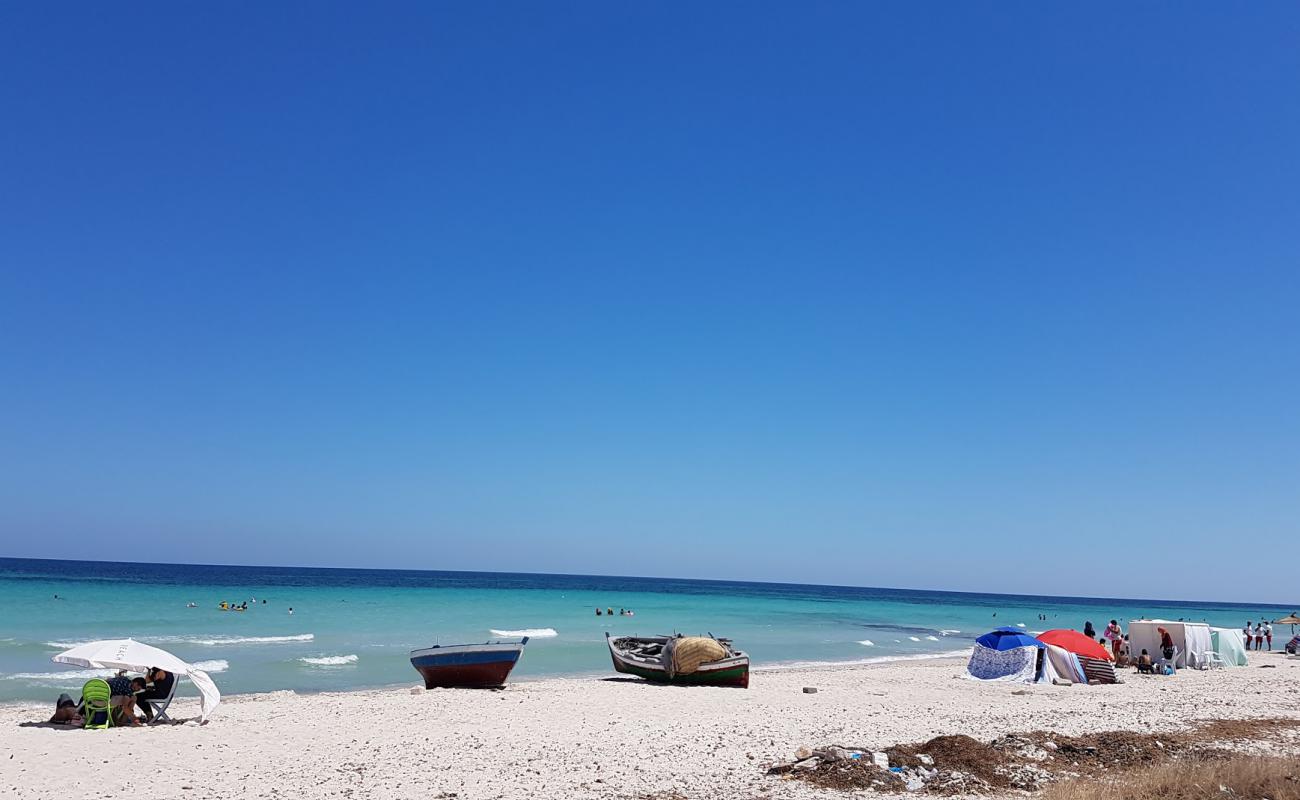 Фото Plage De Rejiche с белый песок поверхностью