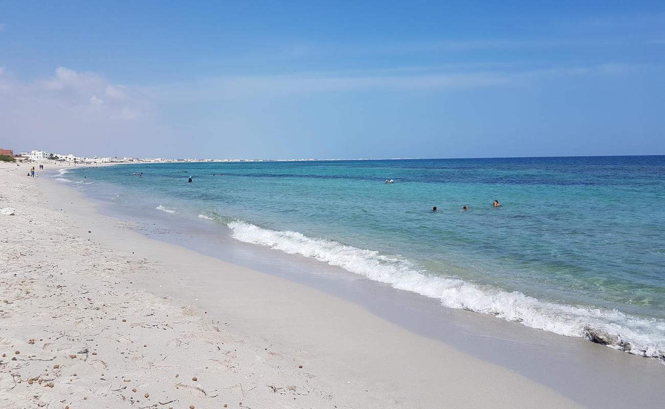 Фото Plage Salakta с белый песок поверхностью