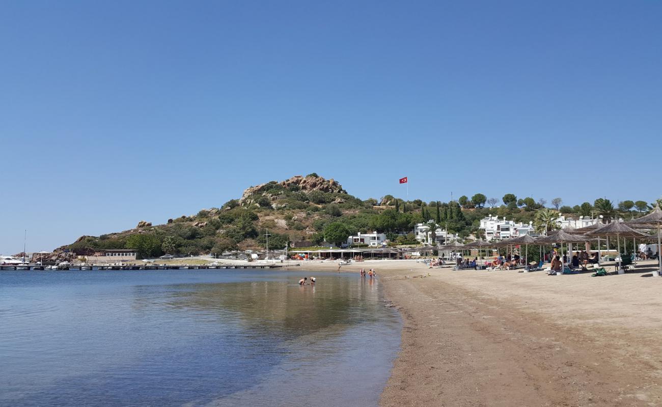 Фото Guvercin Koyu beach с светлый песок поверхностью