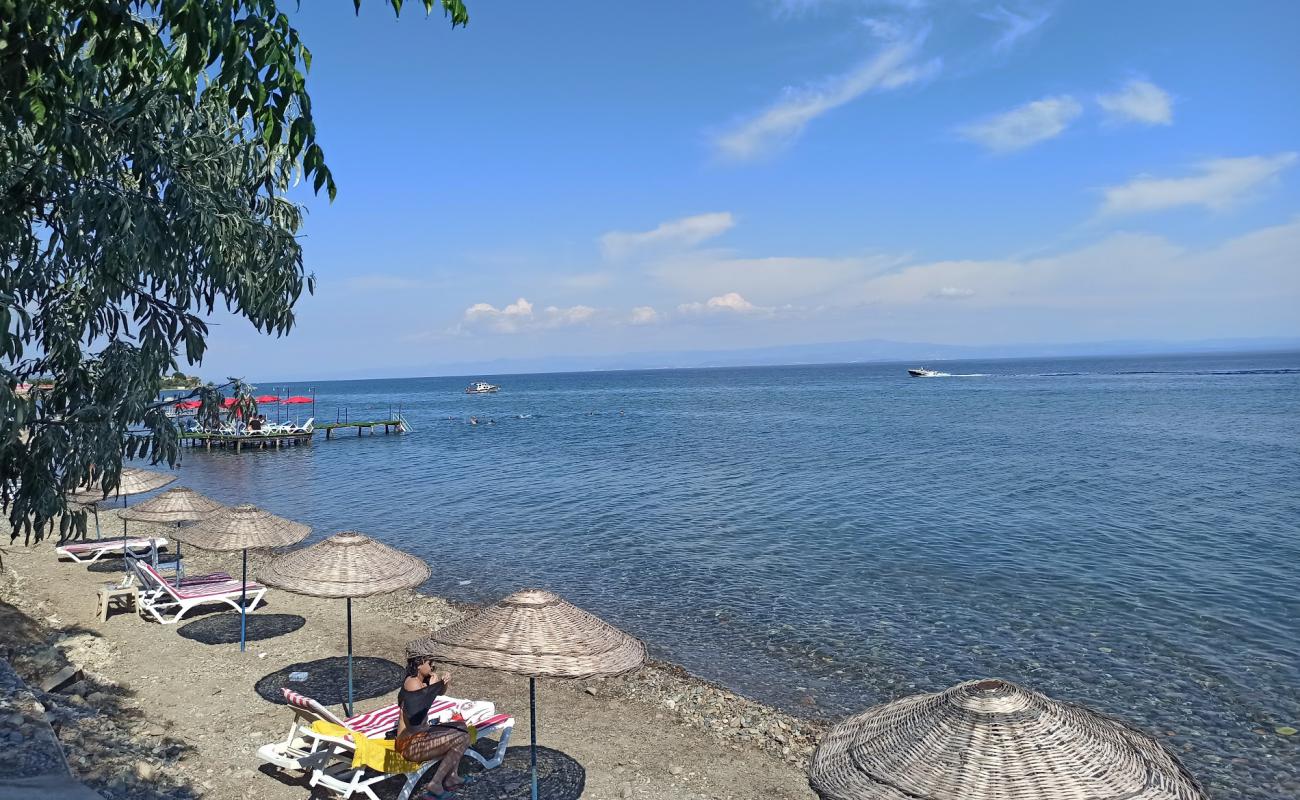 Фото Gunes Cafe beach с светлая галька поверхностью