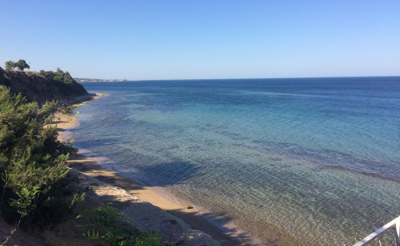 Фото Geyikli Pier beach с светлый песок поверхностью