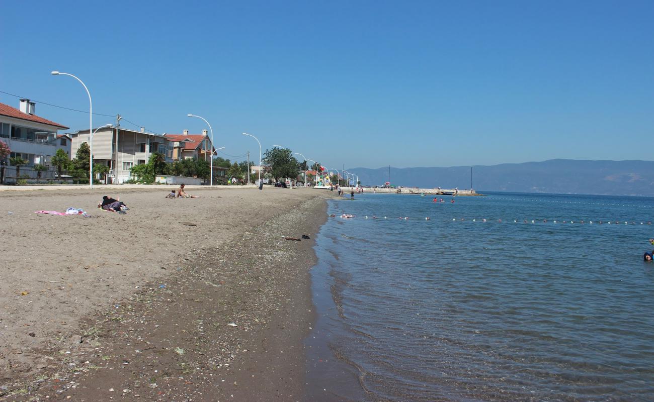 Фото Gemsaz beach с светлый песок поверхностью