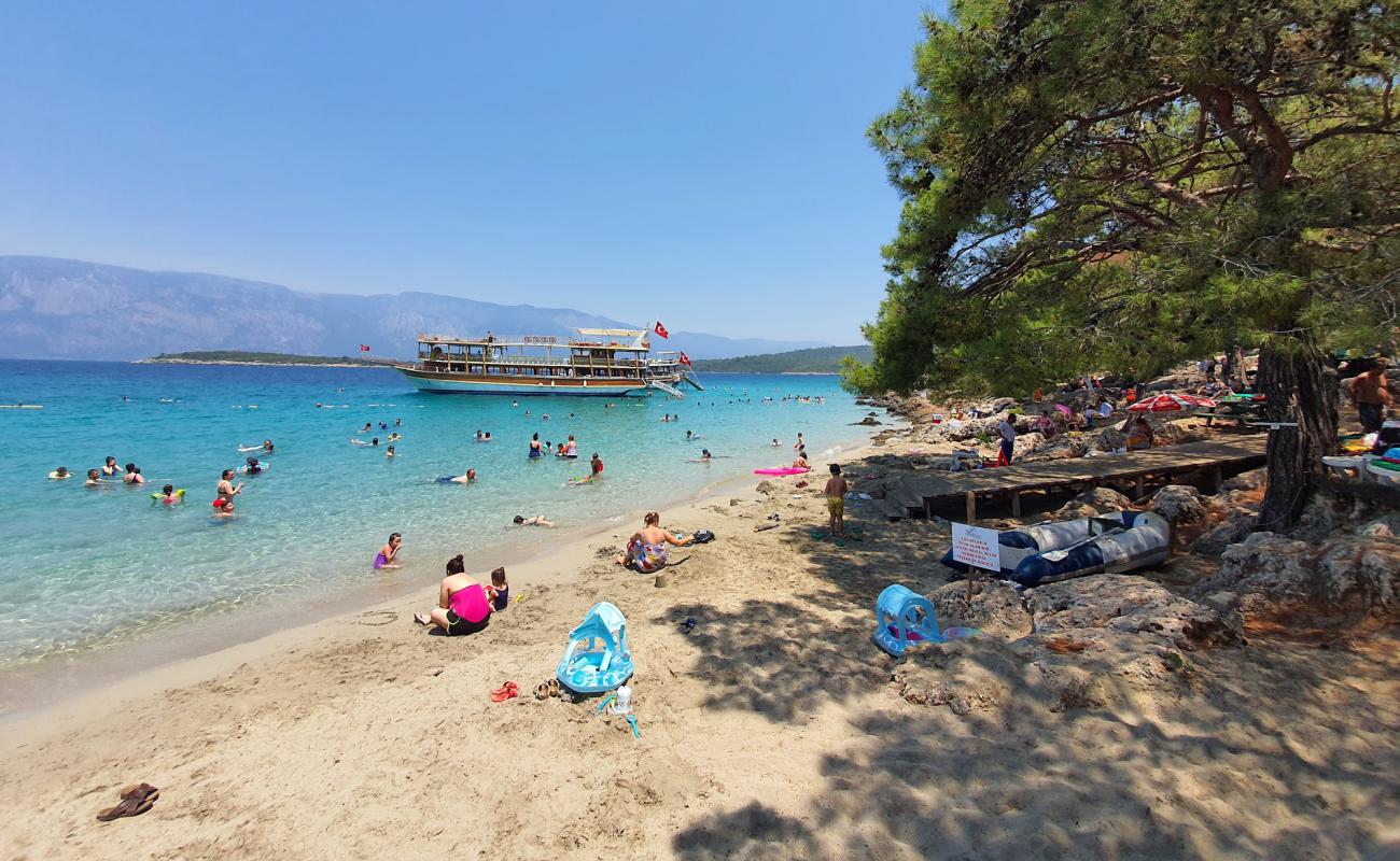 Фото Incekum beach с золотистый песок поверхностью