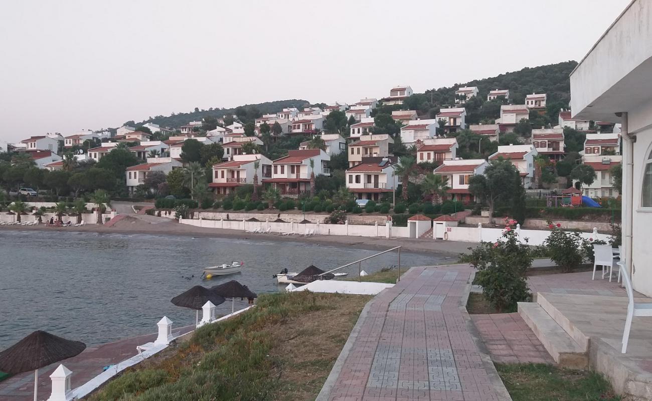 Фото Bastur Beach V с светлый песок поверхностью