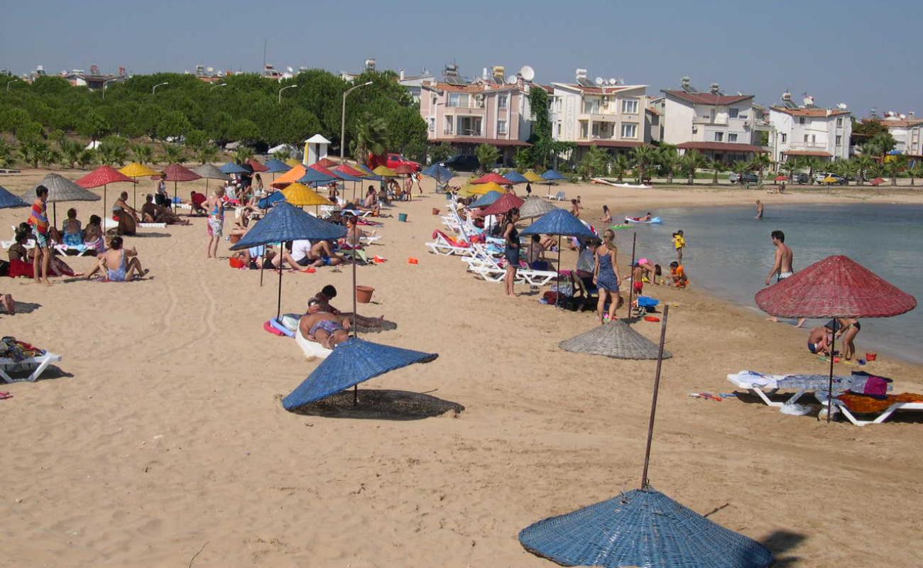 Фото Yildirim beach с темный песок поверхностью