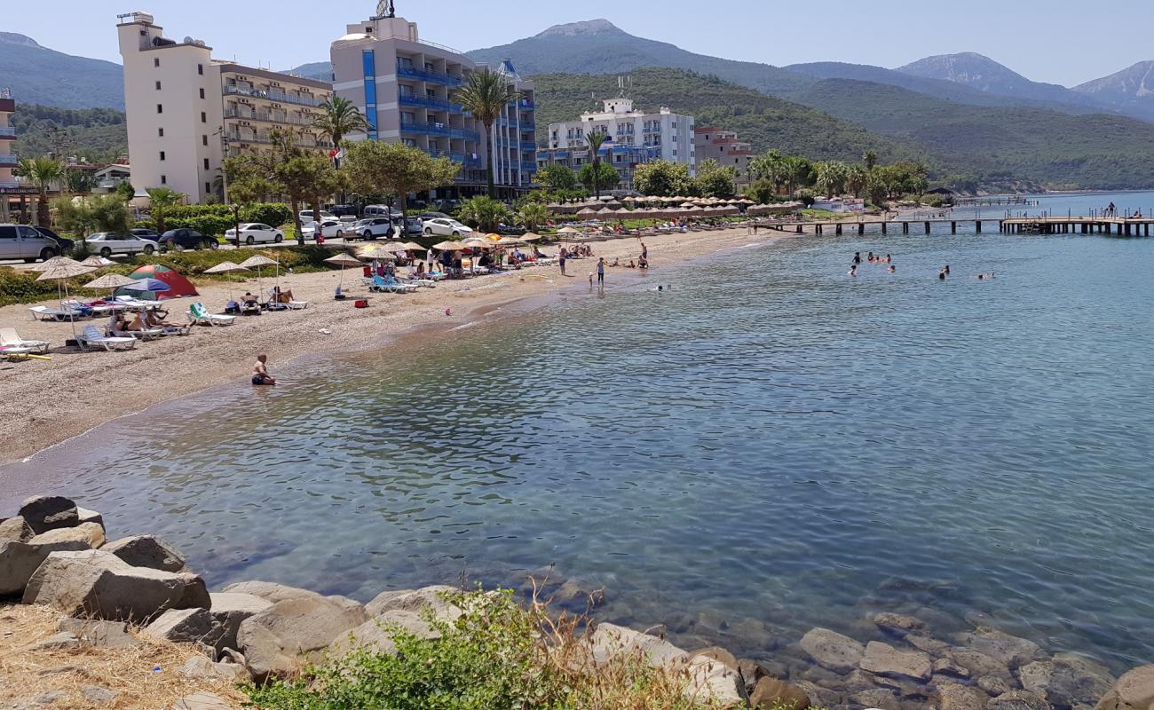 Фото Guzelcamli beach II с светлая галька поверхностью