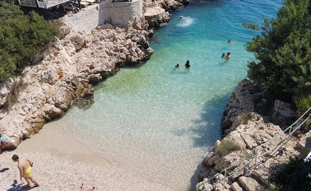 Фото Cinarlar Beach с белая чистая галька поверхностью