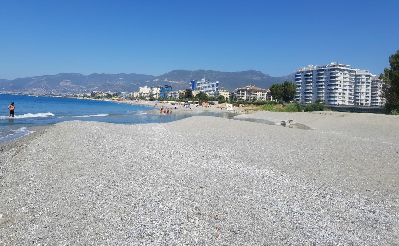 Фото Tosmur beach с песок с галькой поверхностью