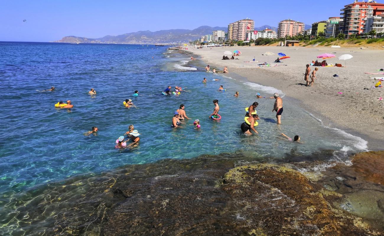 Фото Mahmutlar beach с темная галька поверхностью