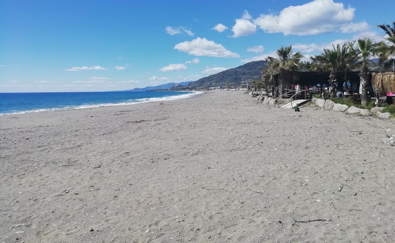 Фото Demirtas beach с темный песок поверхностью