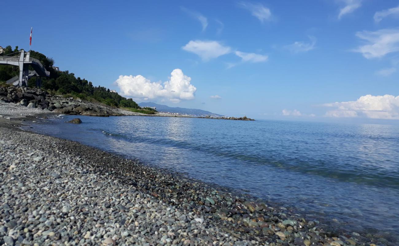 Фото Tasbasi Beach с серая галька поверхностью