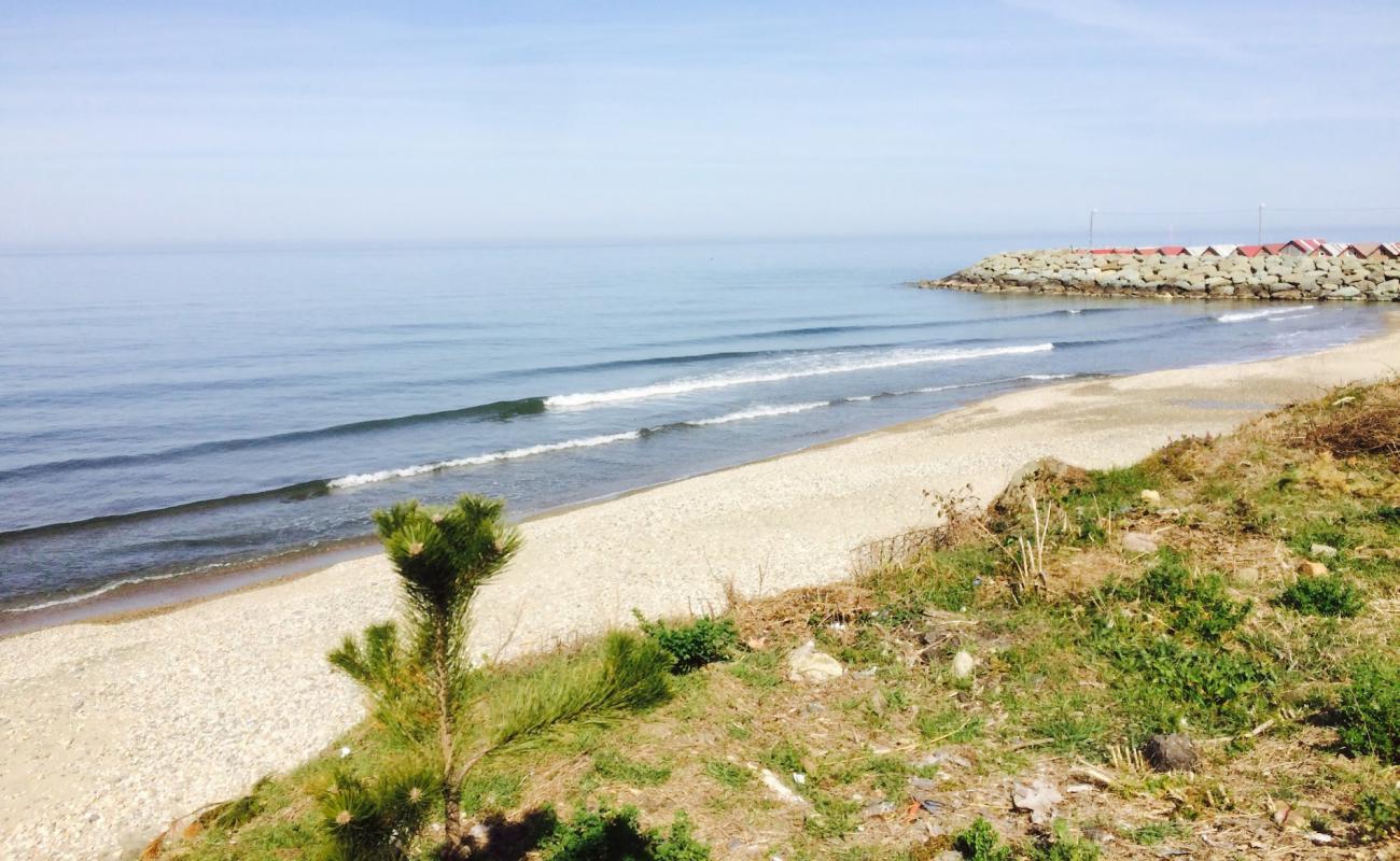 Фото Samayer Beach с светлый песок поверхностью