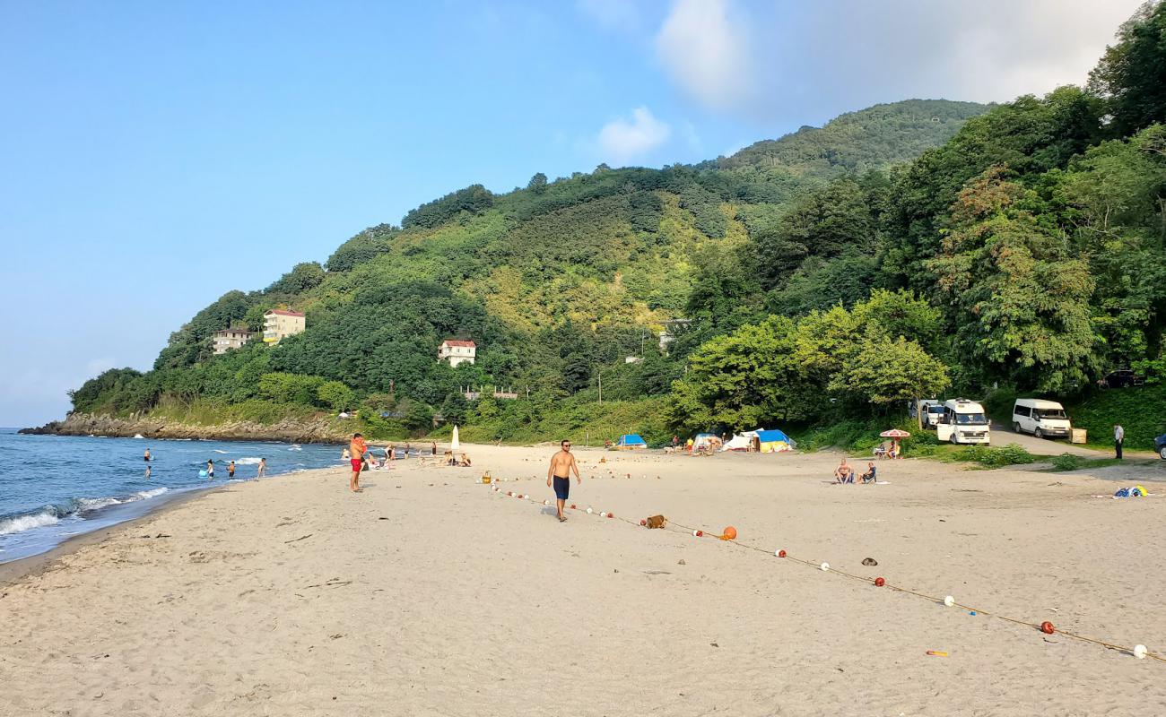 Фото White Beach с светлый песок поверхностью