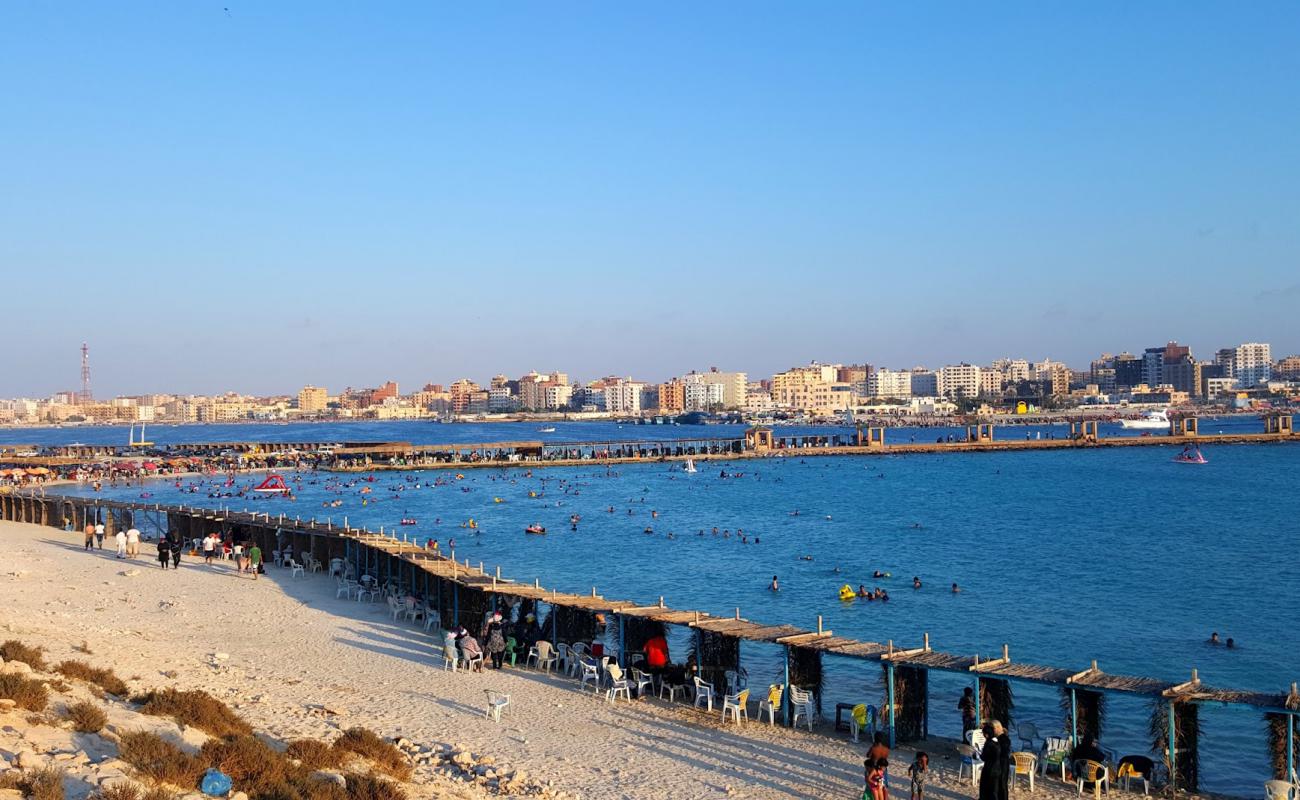 Фото Jona Rommel Beach с светлый песок поверхностью