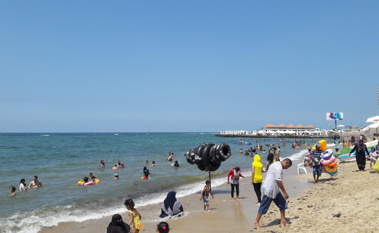 Фото Mandara Beach с золотистый песок поверхностью