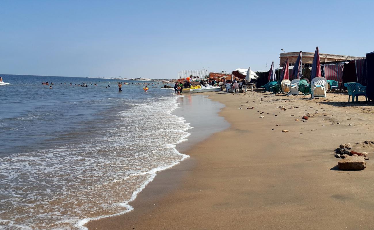 Фото Port Fouad Beach с светлый песок поверхностью