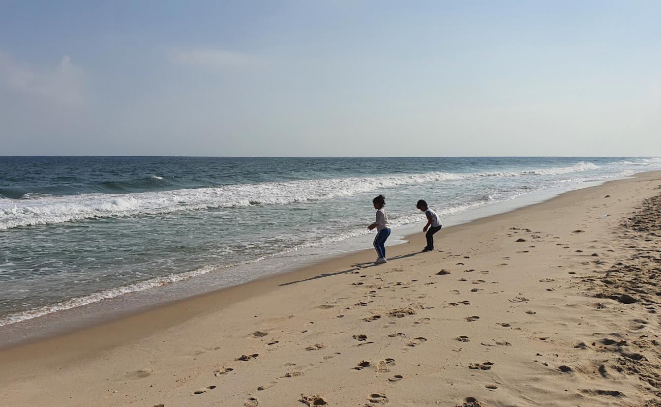 Фото Basata Beach с светлый песок поверхностью