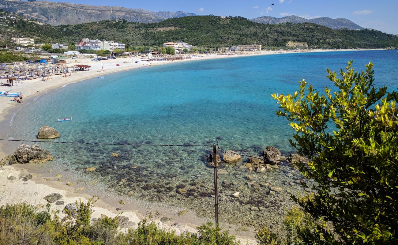 Фото Livadh Beach с светлая галька поверхностью