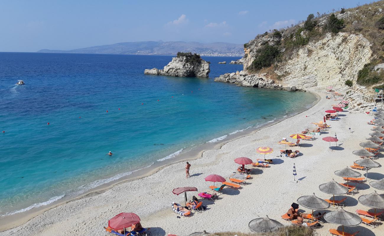 Фото Pasqyra Beach с песок с галькой поверхностью