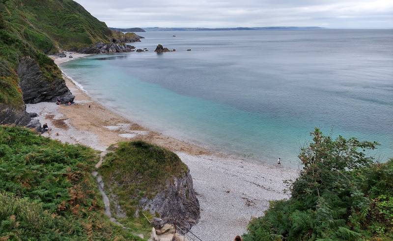 Фото Polstreath Beach с светлый песок поверхностью