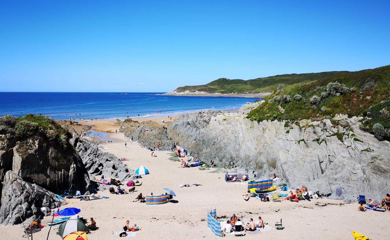 Фото Combesgate beach с серый песок поверхностью