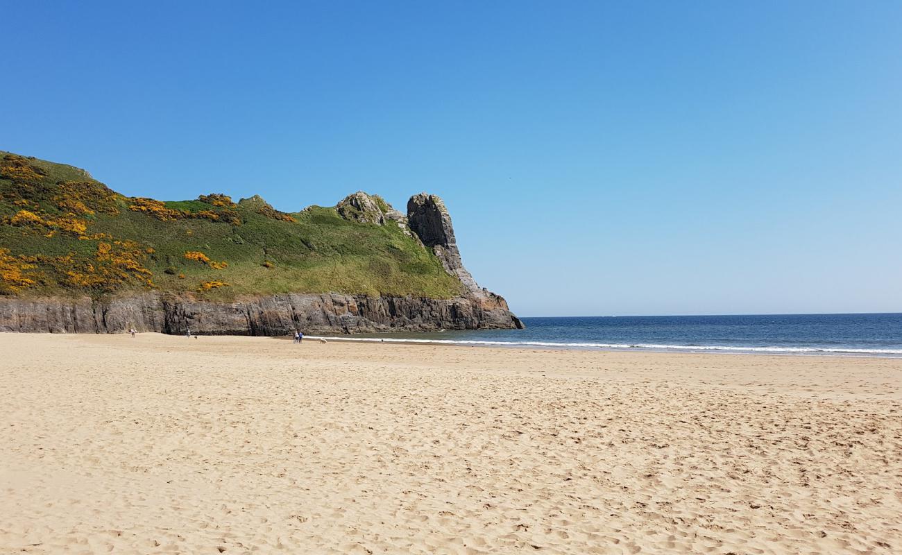 Фото Oxwich Bay beach с золотистый песок поверхностью