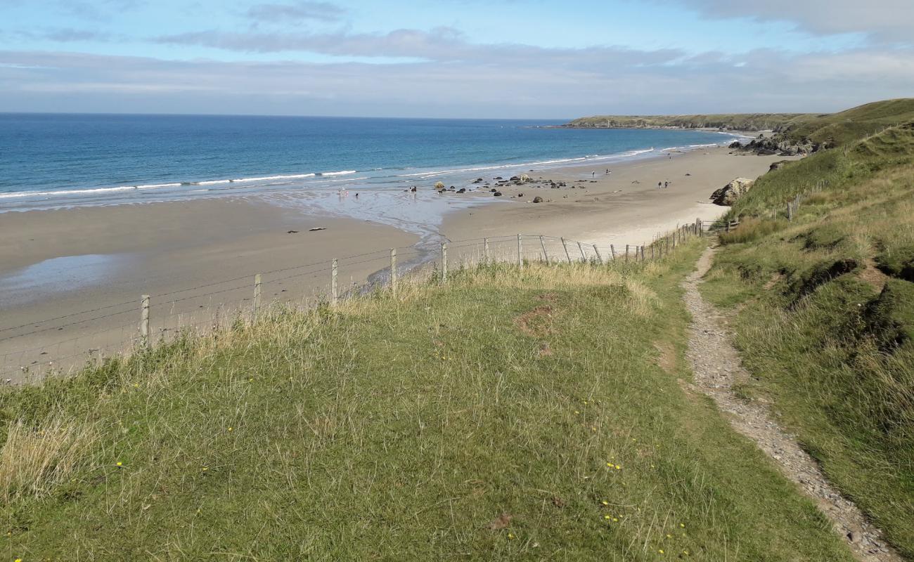 Фото Traeth Penllech с светлый песок поверхностью