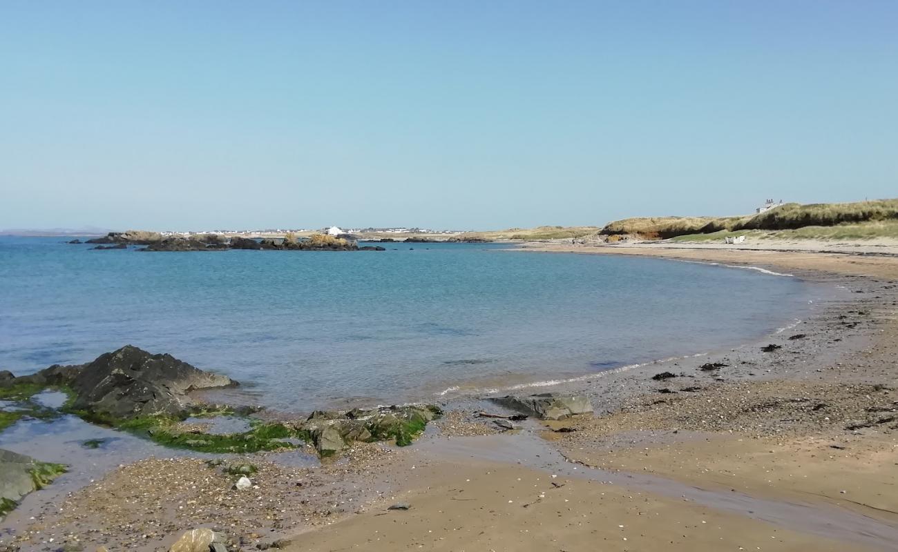 Фото Porth Tyn Tywyn с песок с галькой поверхностью