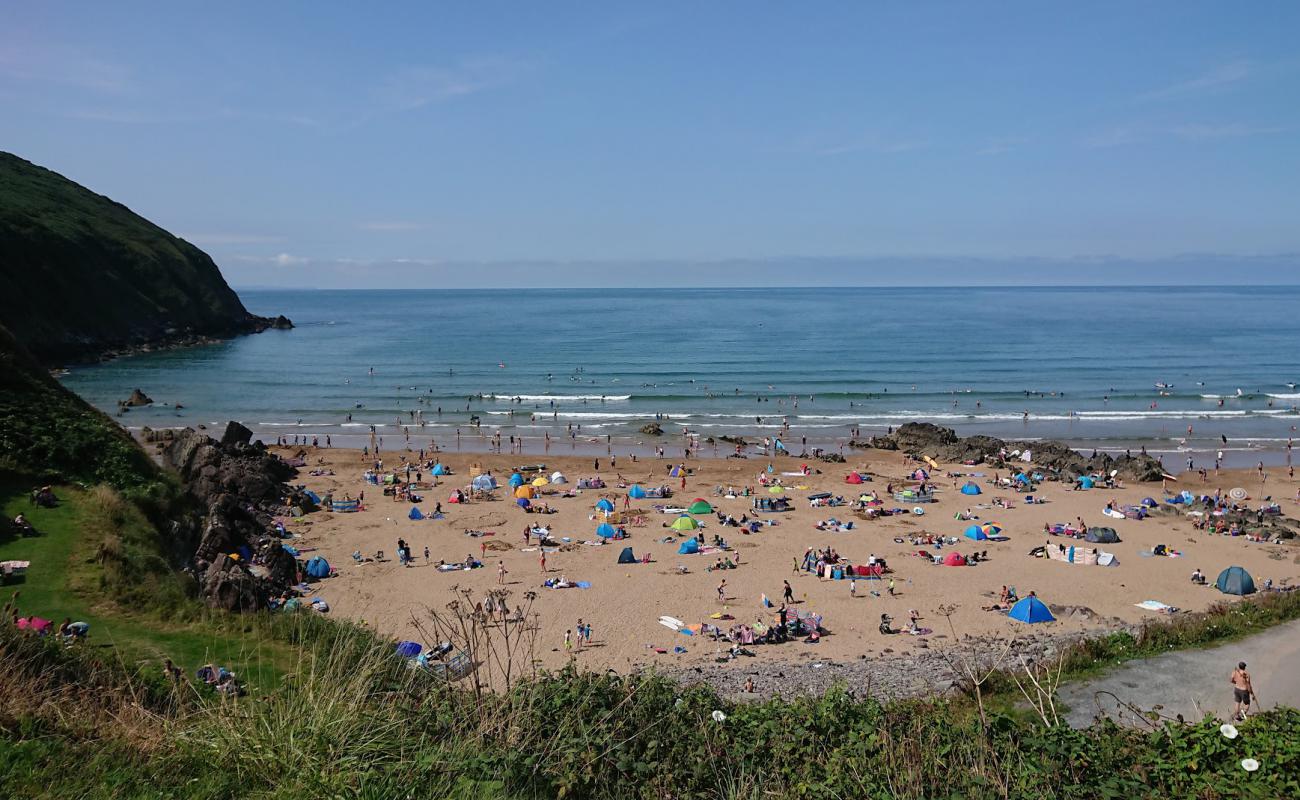 Фото Putsborough beach с светлый песок поверхностью