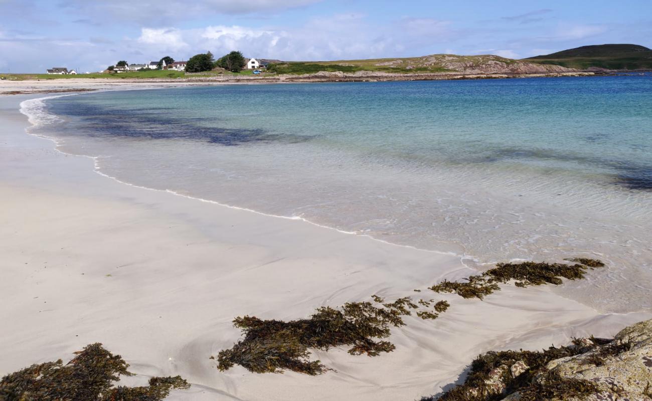 Фото Mellon Udrigle Beach с светлый песок поверхностью