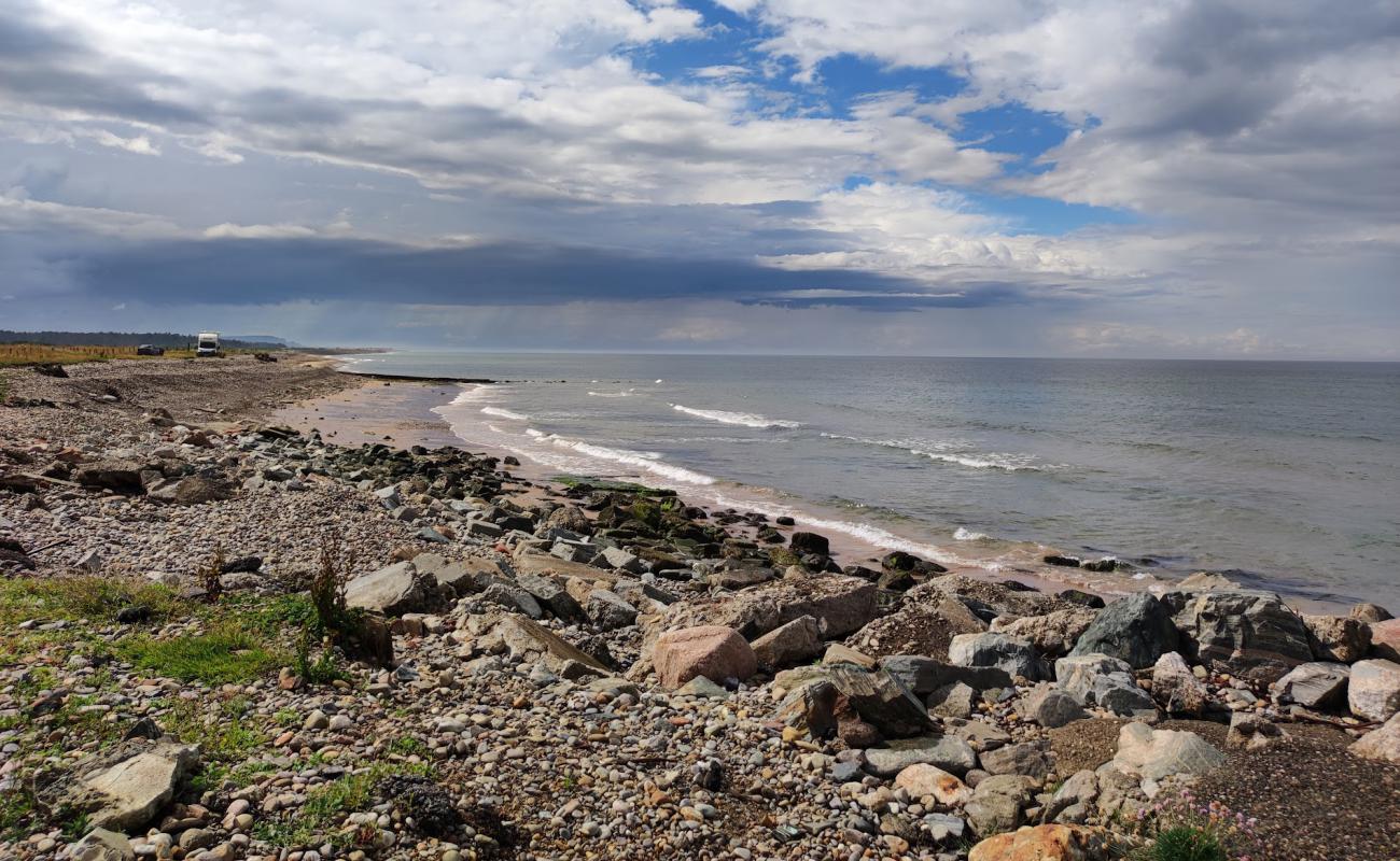 Фото Portgordon Beach с песок с камнями поверхностью