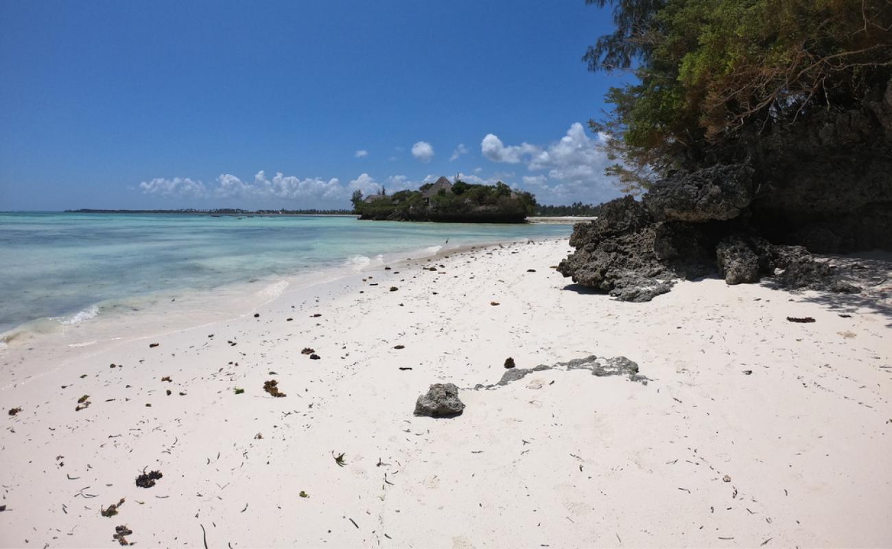 Фото Bawe Beach с золотистый песок поверхностью