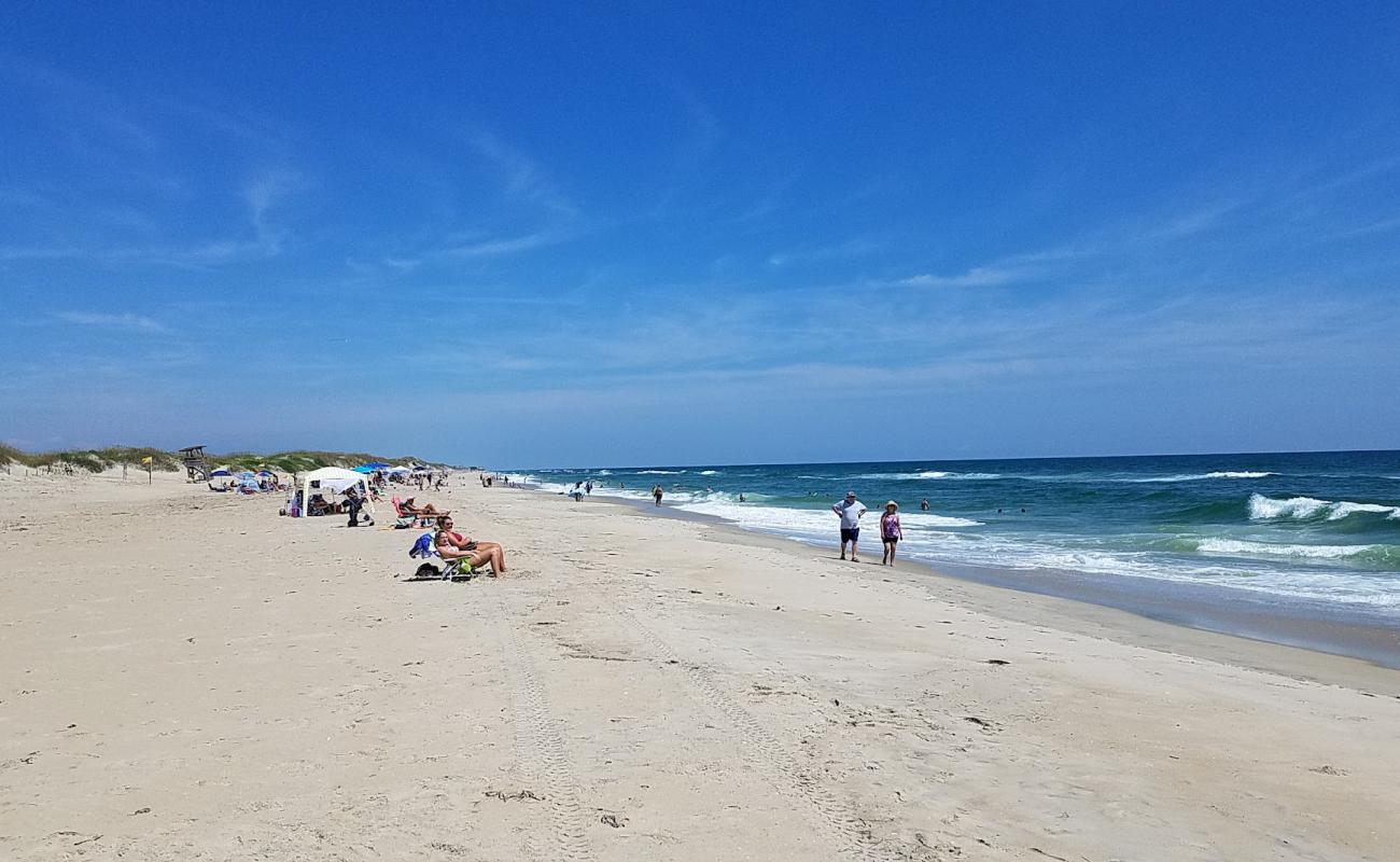 Фото Coquina beach с светлый песок поверхностью