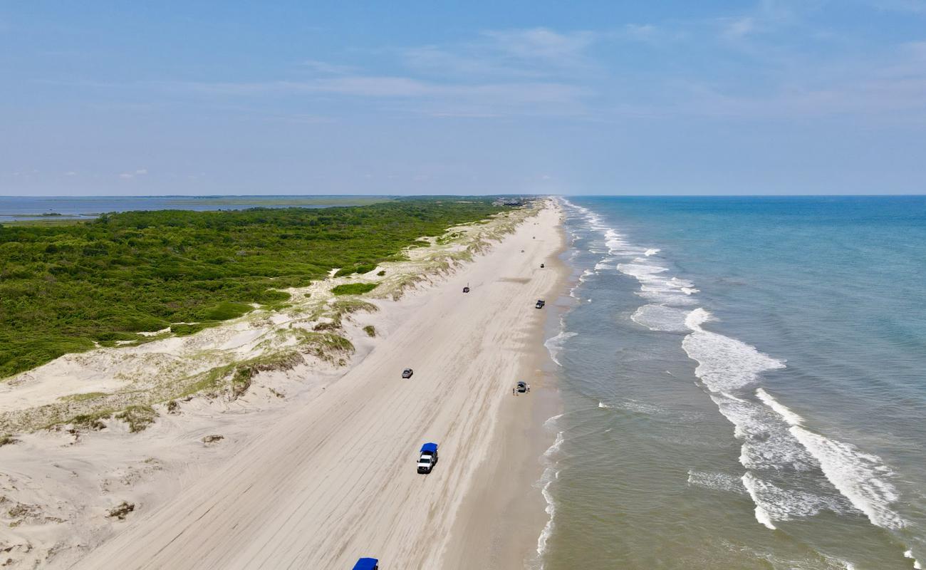 Фото Corolla beach II с светлый песок поверхностью