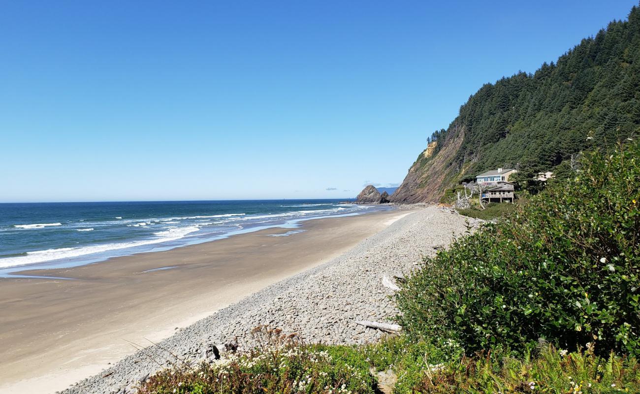 Фото Cove Beach с песок с галькой поверхностью