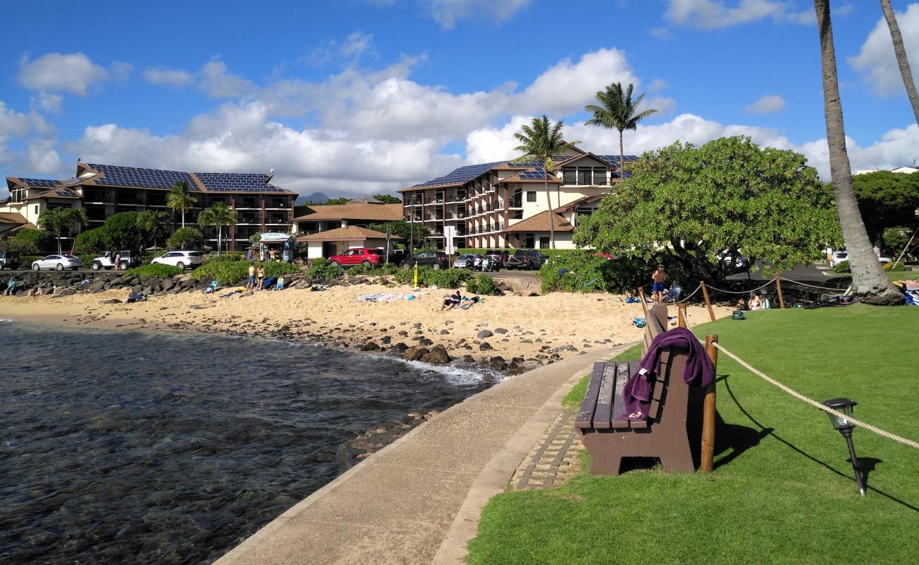 Фото Lawa'i Beach с песок с камнями поверхностью