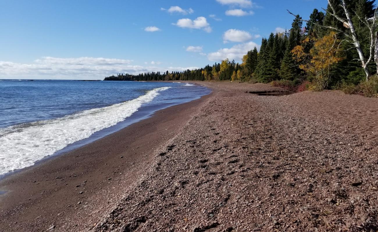 Фото Paradise Beach с песок с камнями поверхностью