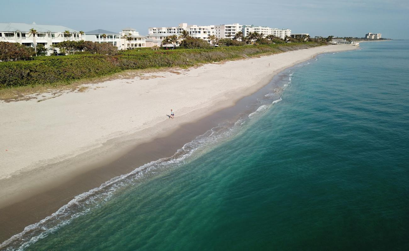 Фото Jupiter Beach с светлый песок поверхностью