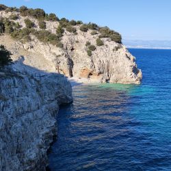 Фото Klancac beach с кристальная вода поверхностью