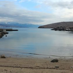 Фото Rudine beach с кристальная вода поверхностью