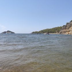 Фото Iztuzu beach II с кристальная вода поверхностью