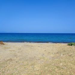 Фото Guzelcamli beach с кристальная вода поверхностью